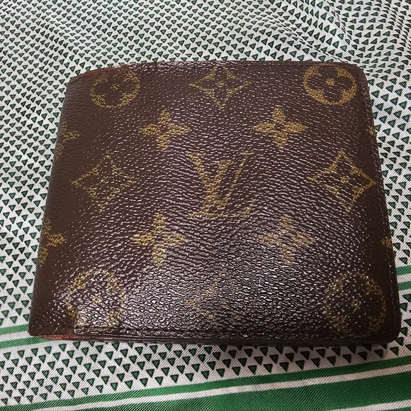 Louis Vuitton Other - Authentic Louis Vuitton Vintage Mens Bifold wallet.